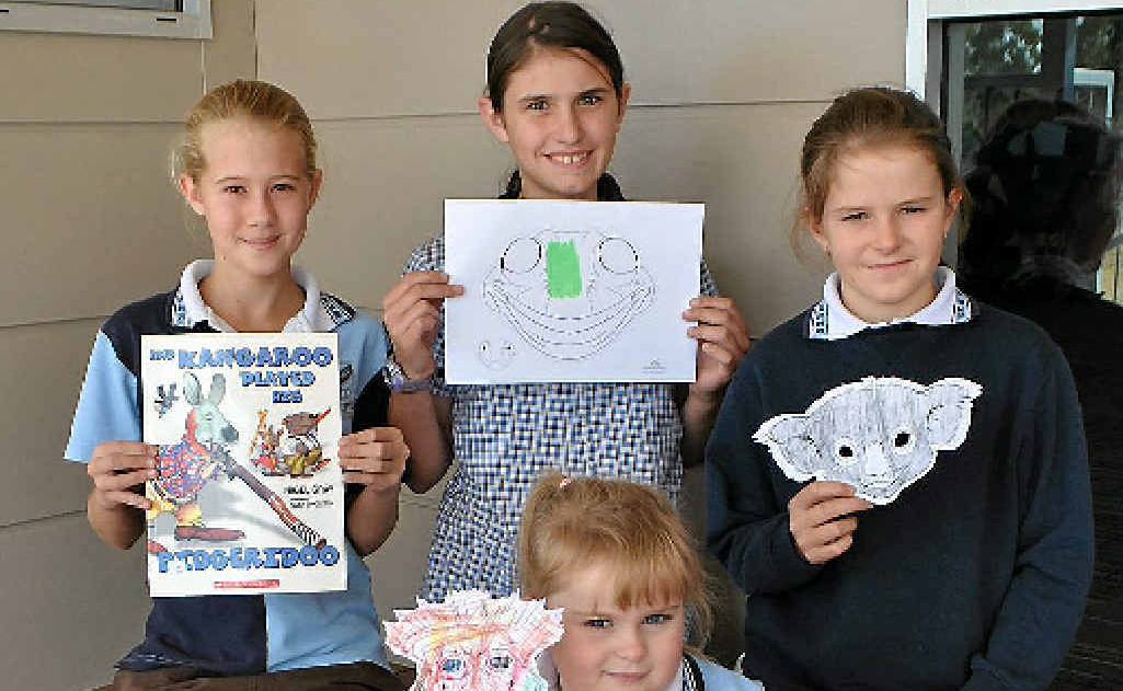 Making Australian animal masks inspired by the book they read are (back from left) Julia Walker, Ashleigh Browne, Kyarnee King-Taylor and (front) Micheala Harrington.